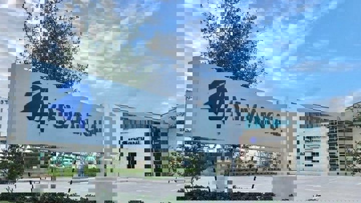 Advancial company sign and corporate building.